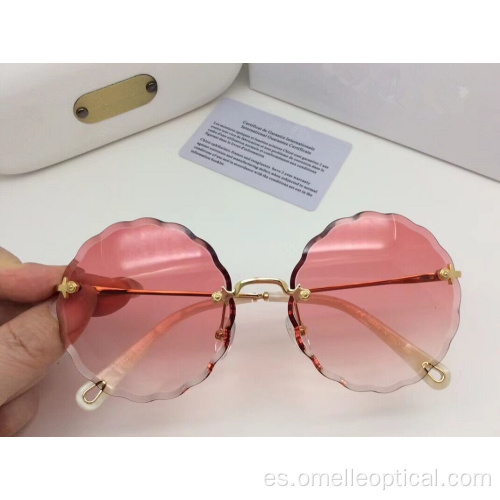 Gafas de sol redondas sin montura de alta calidad para mujeres